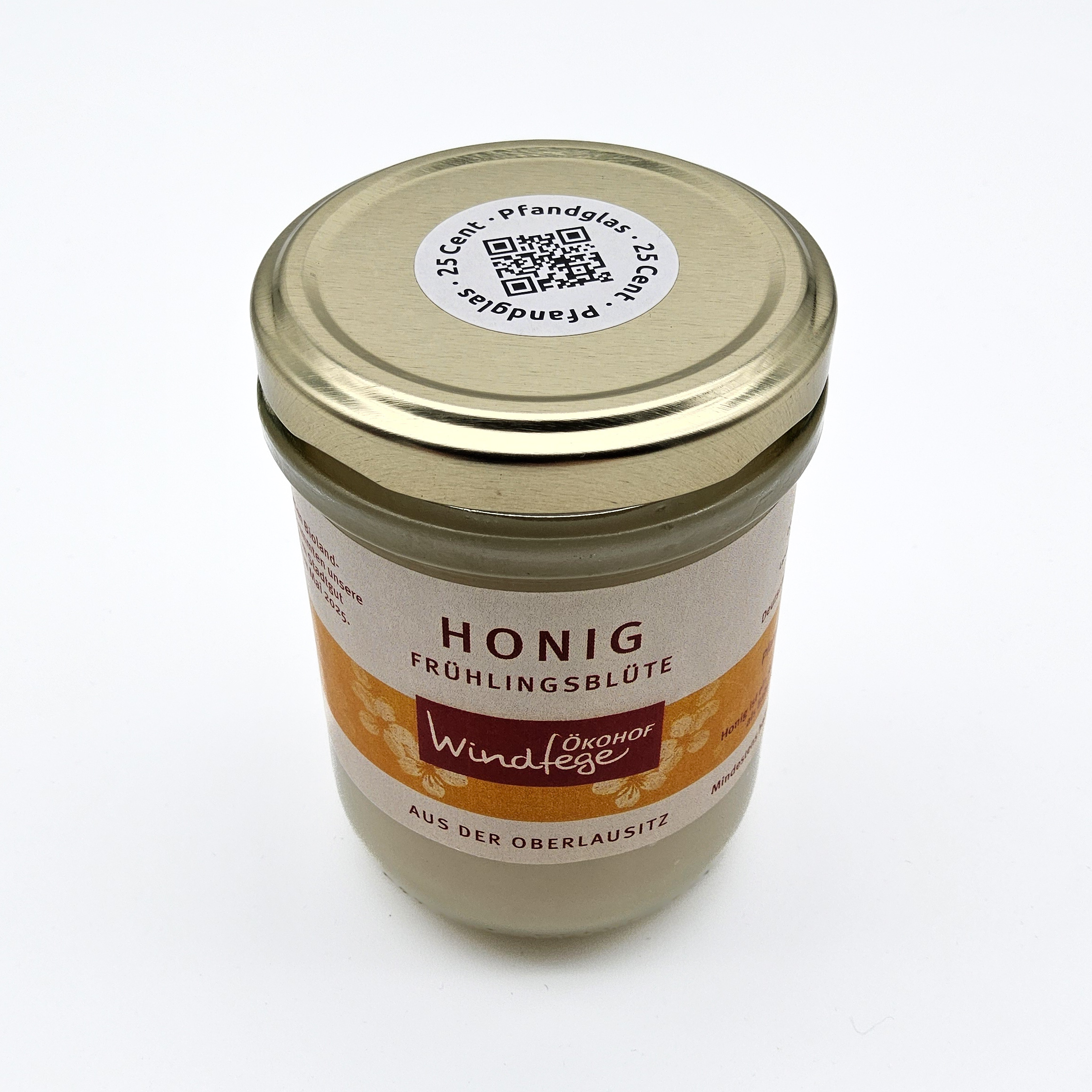 Das Honig-Pfandglas von Windfege von schräg oben fotografiert